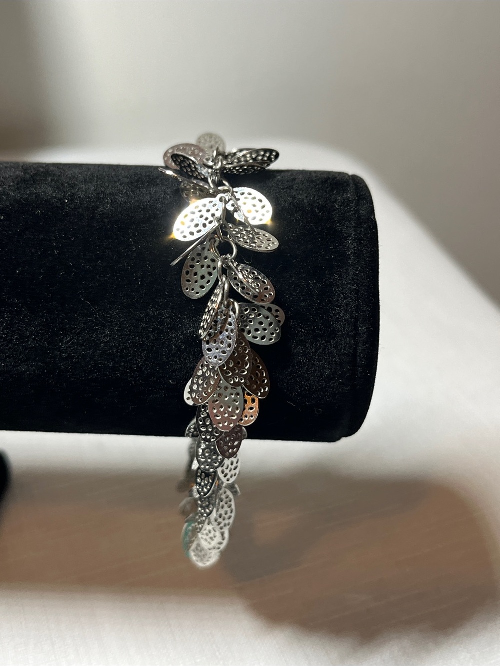 TOCARA Silver Leaf Cascade Bracelet 
STAINLESS STEEL
Stamped